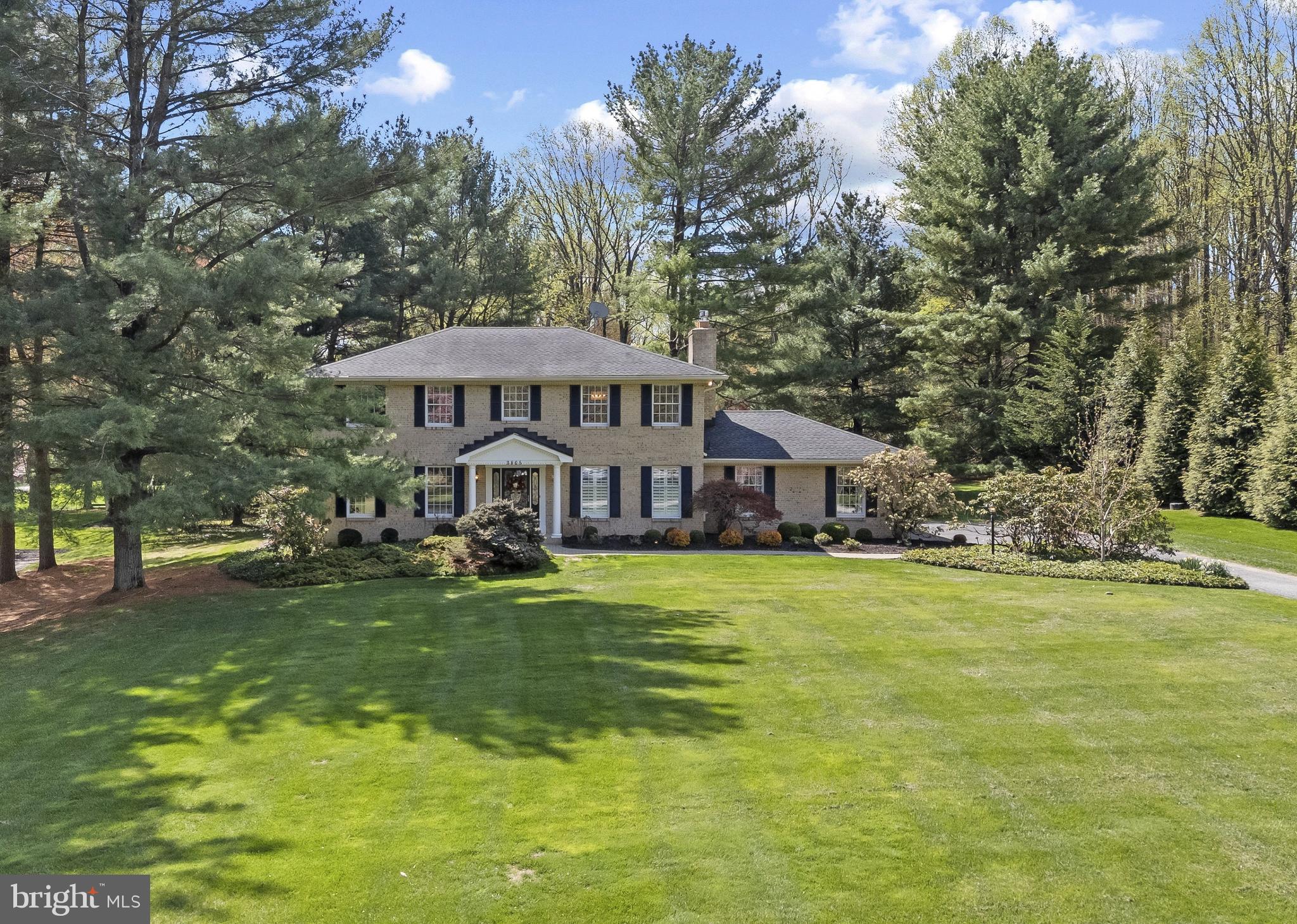 3805 Duddington Way Phoenix, MD 21131 - Photo 6 of 69 a view of a big house with a big yard and large trees