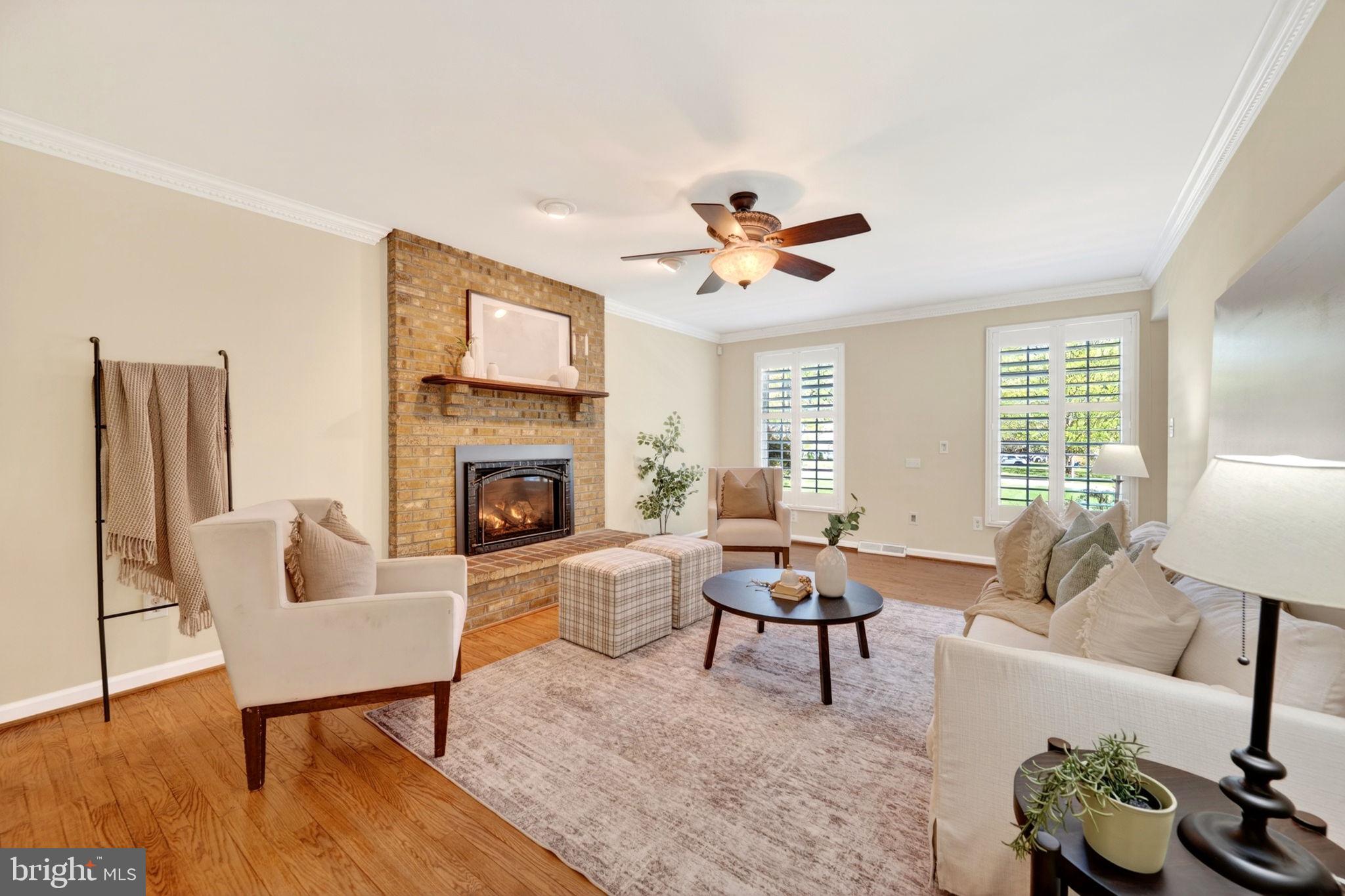 3805 Duddington Way Phoenix, MD 21131 - Photo 7 of 69 a living room with furniture fireplace and window
