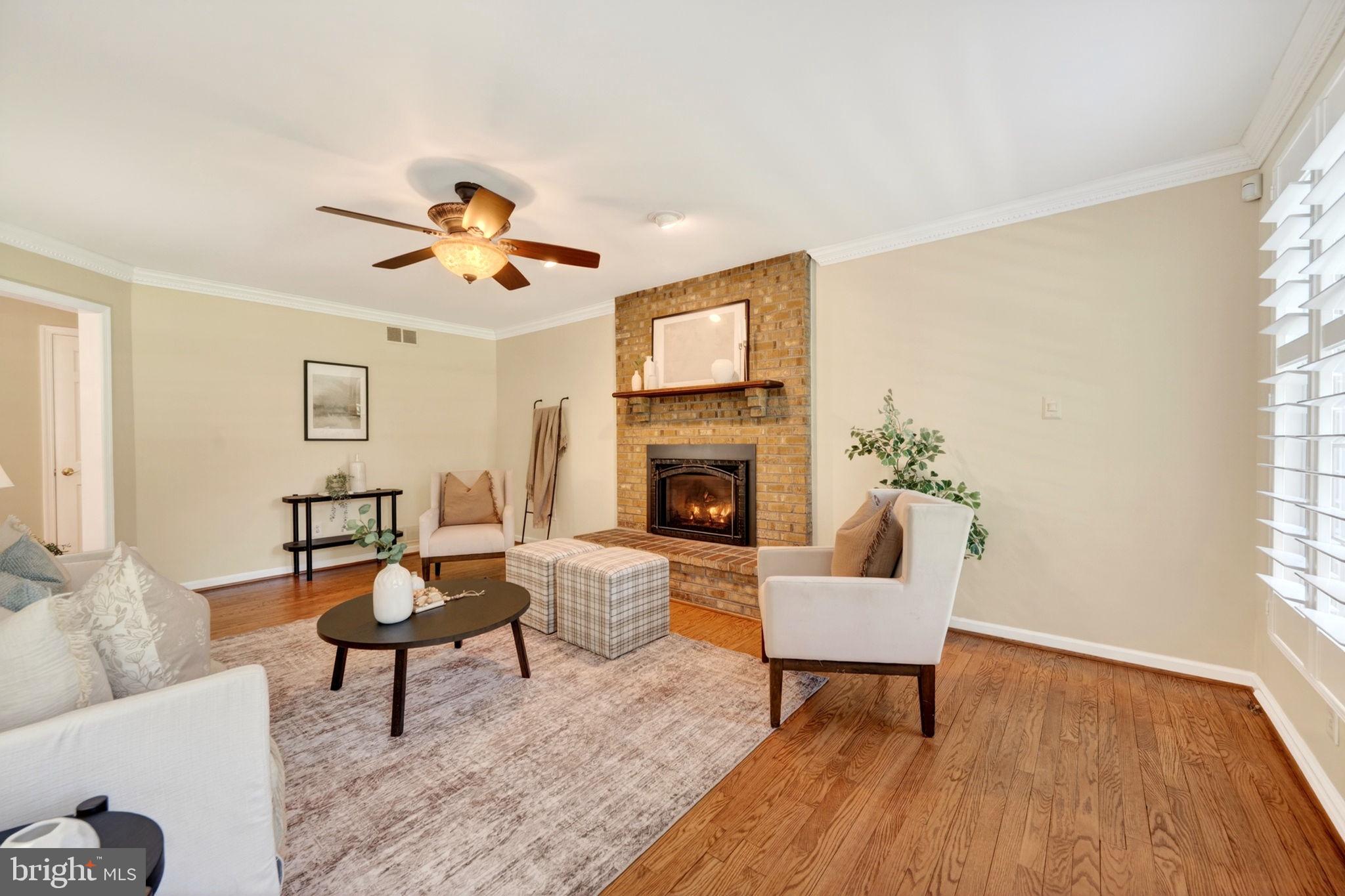 3805 Duddington Way Phoenix, MD 21131 - Photo 10 of 69 a living room with furniture and a fireplace