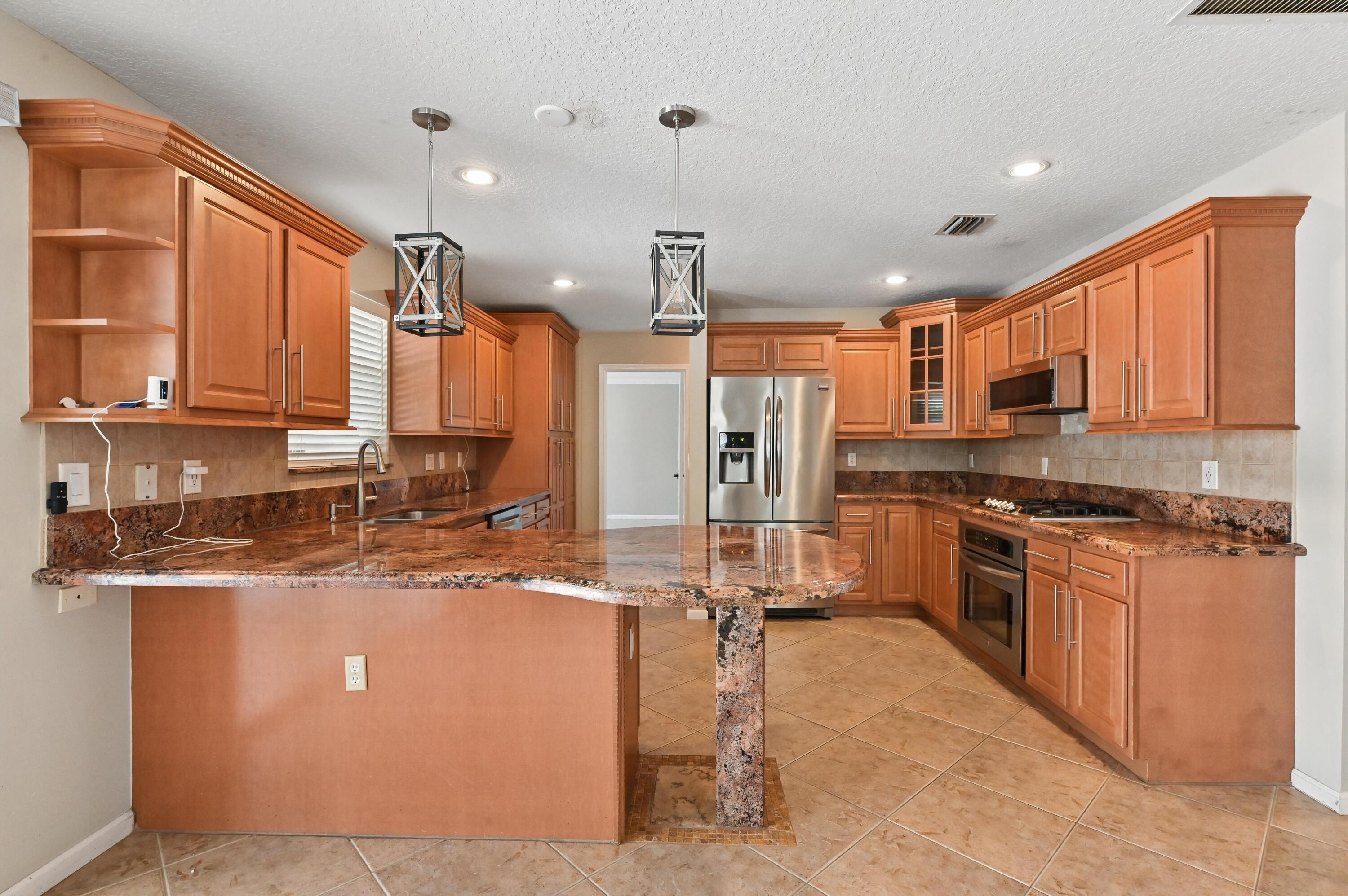 1163 Peninsula Way Greenacres, FL 33413 - Photo 10 of 40 13 Kitchen 01