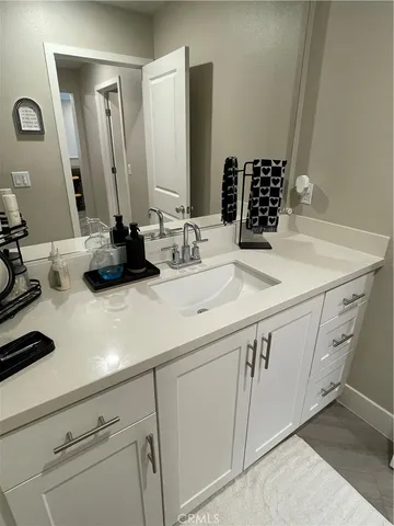 a bathroom with a shower and a bath tub