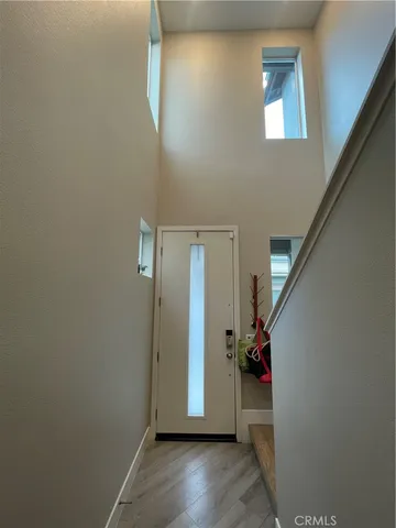 a room with furniture and wooden floor