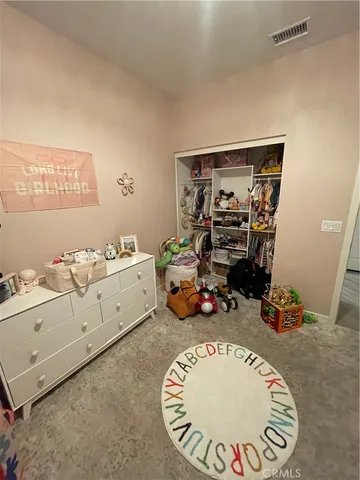 a bathroom with a sink toilet and mirror