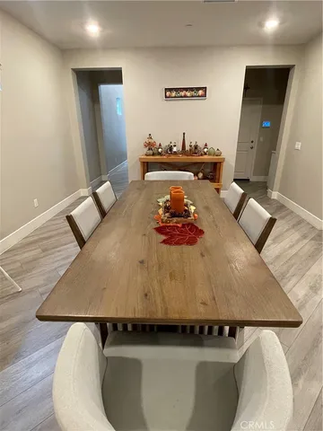 a view of living room with furniture and a flat screen tv