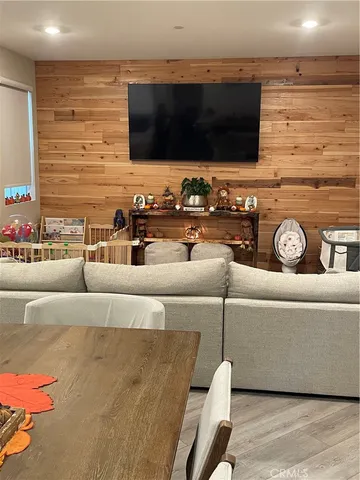 a bed sitting in a room next to a window