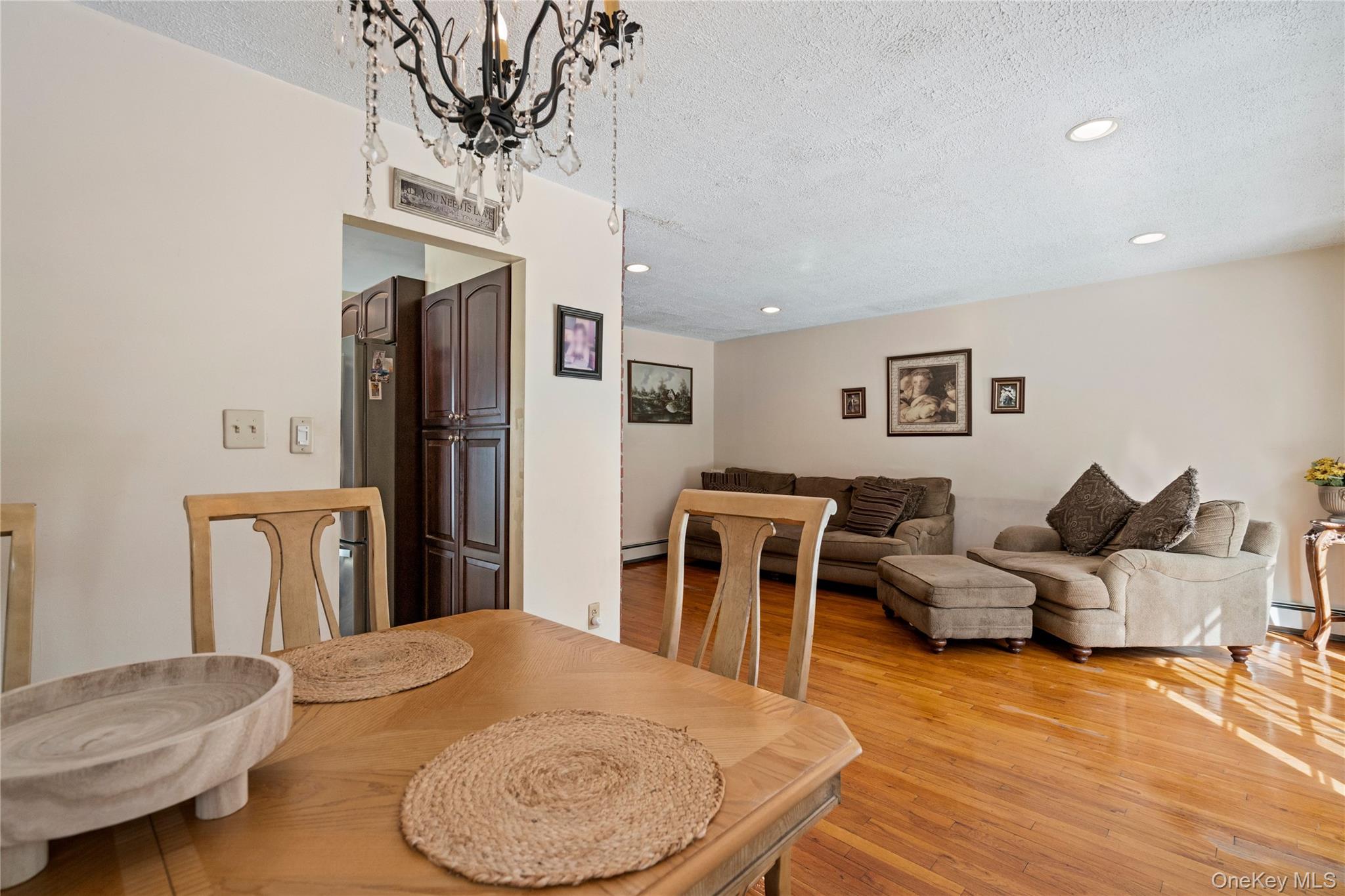 25 State Place Huntington, NY 11743 - Photo 11 of 33 a living room with furniture and a wooden floor