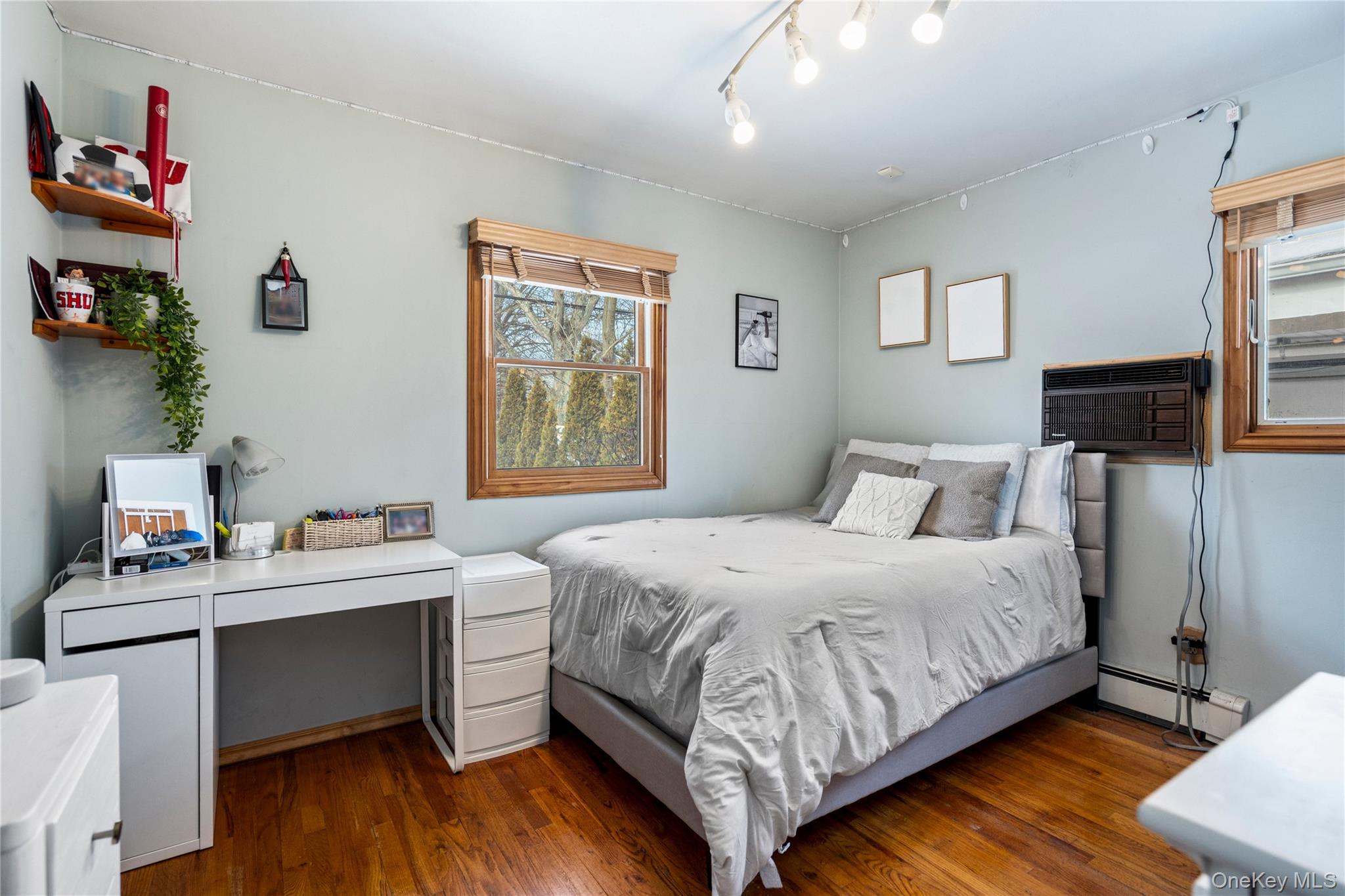 25 State Place Huntington, NY 11743 - Photo 23 of 33 a bed room with a bed and a window