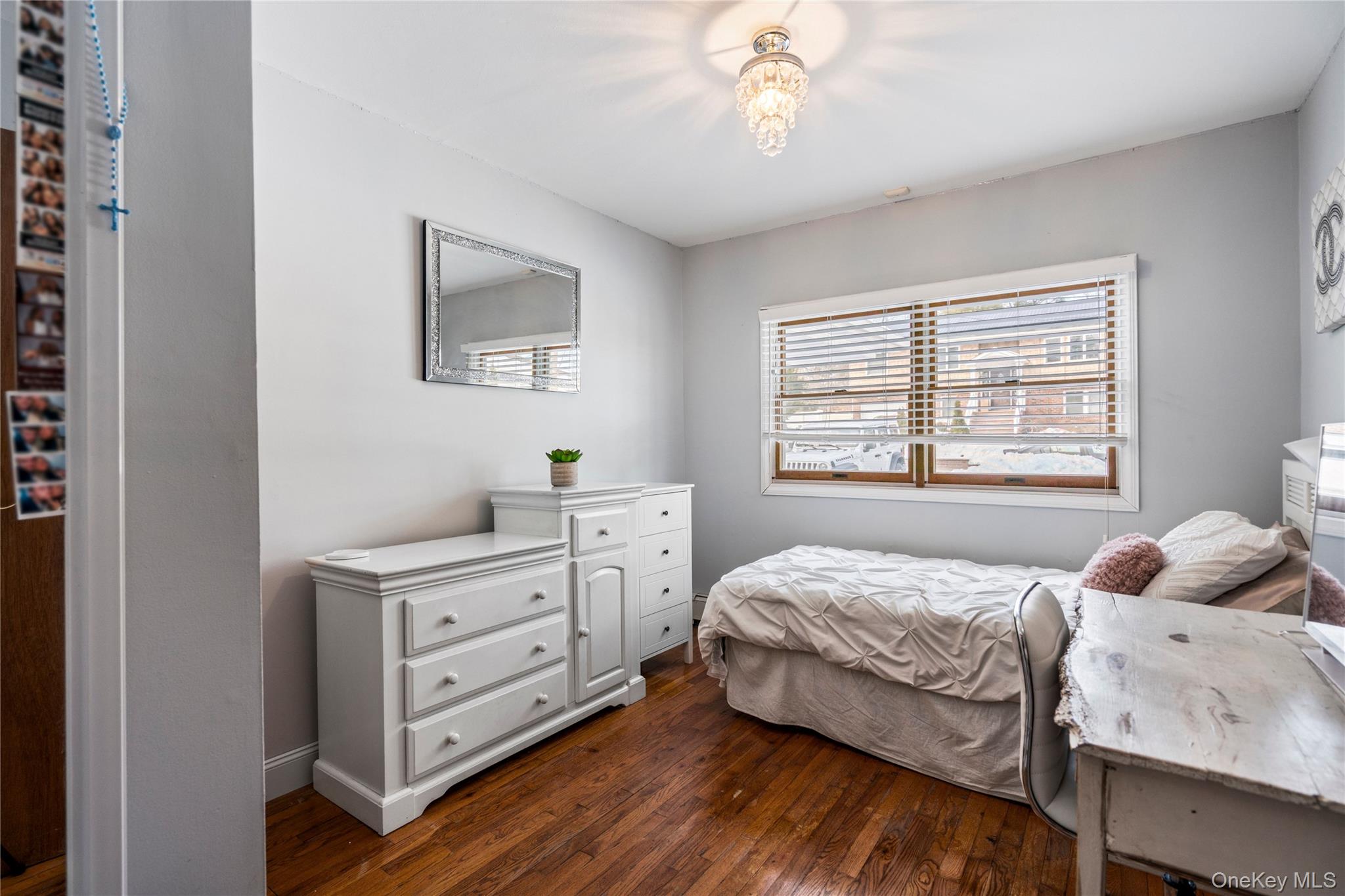 25 State Place Huntington, NY 11743 - Photo 24 of 33 a bedroom with a bed and a window