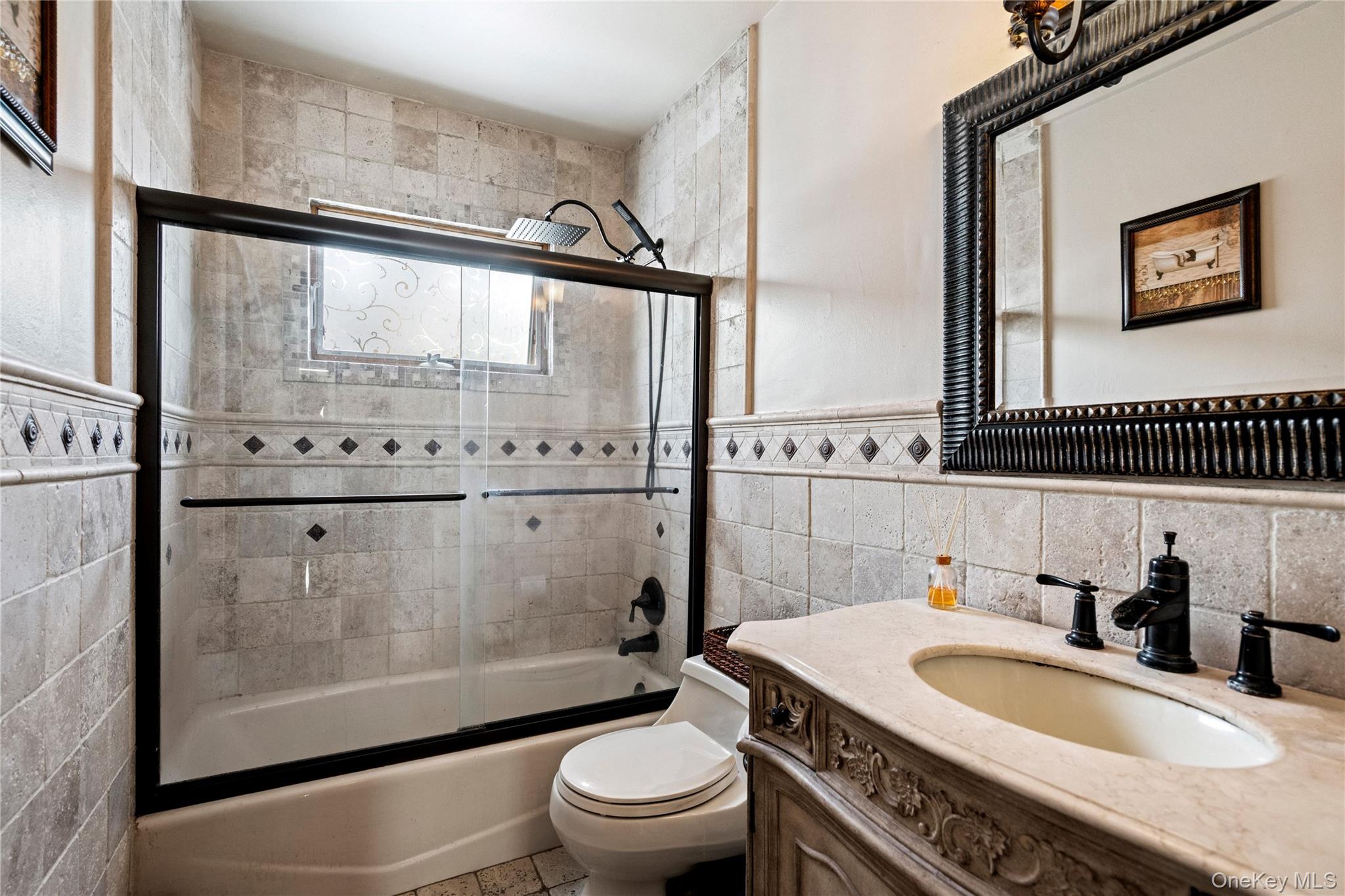 25 State Place Huntington, NY 11743 - Photo 25 of 33 a bathroom with a sink toilet and shower