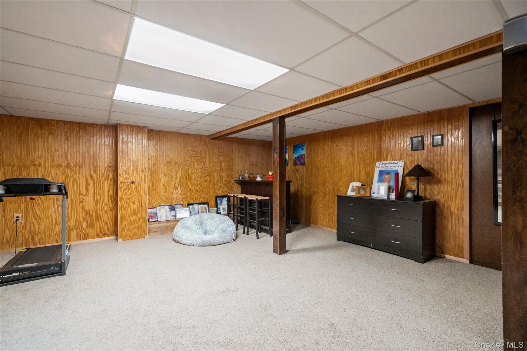 25 State Place Huntington, NY 11743 - Photo 27 of 33 a living room with furniture and a window