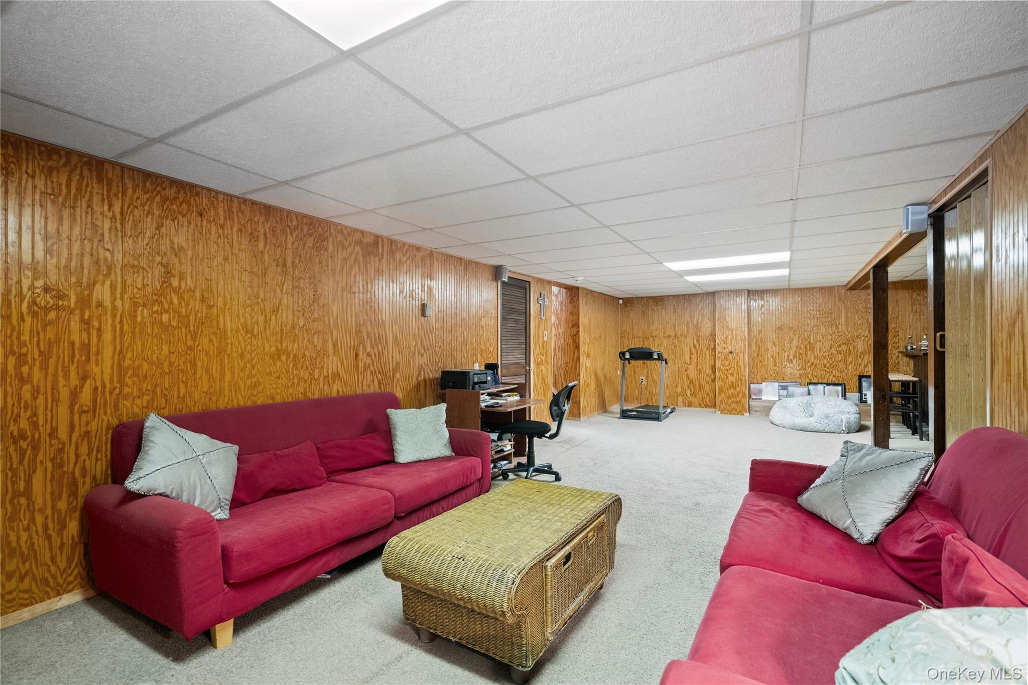 25 State Place Huntington, NY 11743 - Photo 29 of 33 a living room with furniture and a wooden floor
