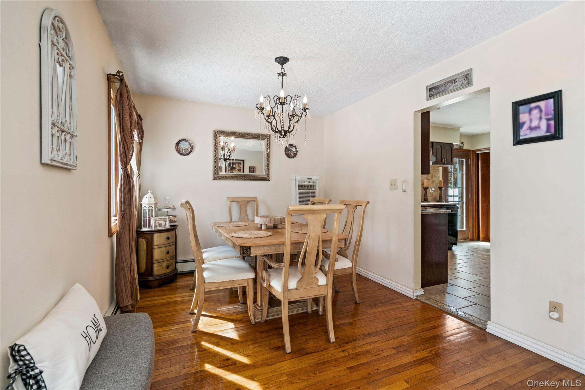 25 State Place Huntington, NY 11743 - Photo 9 of 33 a view of a dining room with furniture and wooden floor