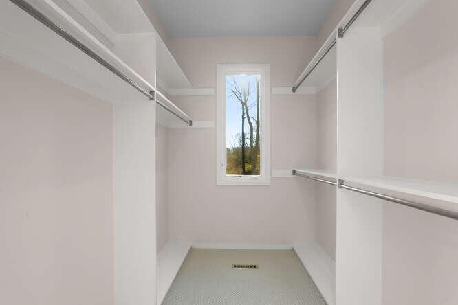 87 Lambert Road New Canaan, CT 06840 - Photo 16 of 39 a view of small space with racks on the wall