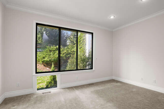 87 Lambert Road New Canaan, CT 06840 - Photo 17 of 39 an empty room with a window
