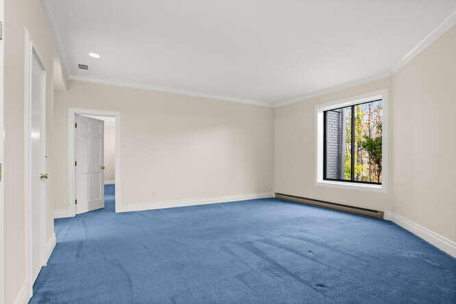 87 Lambert Road New Canaan, CT 06840 - Photo 26 of 39 an empty room with windows