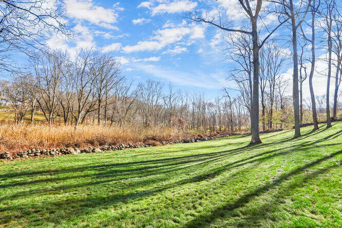 87 Lambert Road New Canaan, CT 06840 - Photo 38 of 39 a big yard with lots of green space