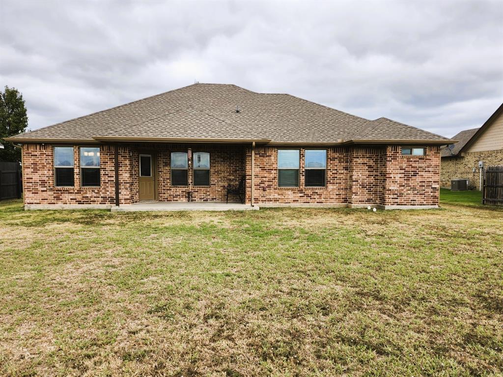 110 Joyce Street Whitney, TX 76692 - Photo 13 of 13 a front view of house with yard