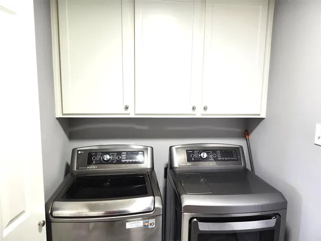 a stove top oven sitting inside of a kitchen
