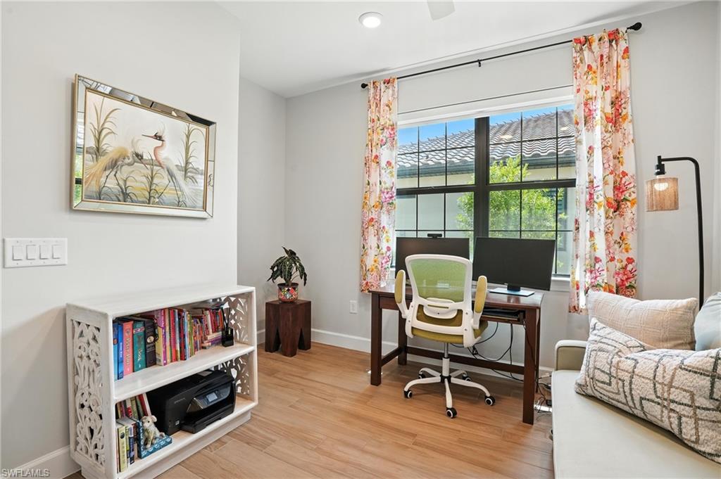11945 Sacra Place Fort Myers, FL 33913 - Photo 17 of 50 Home office featuring wood finished floors and recessed lighting