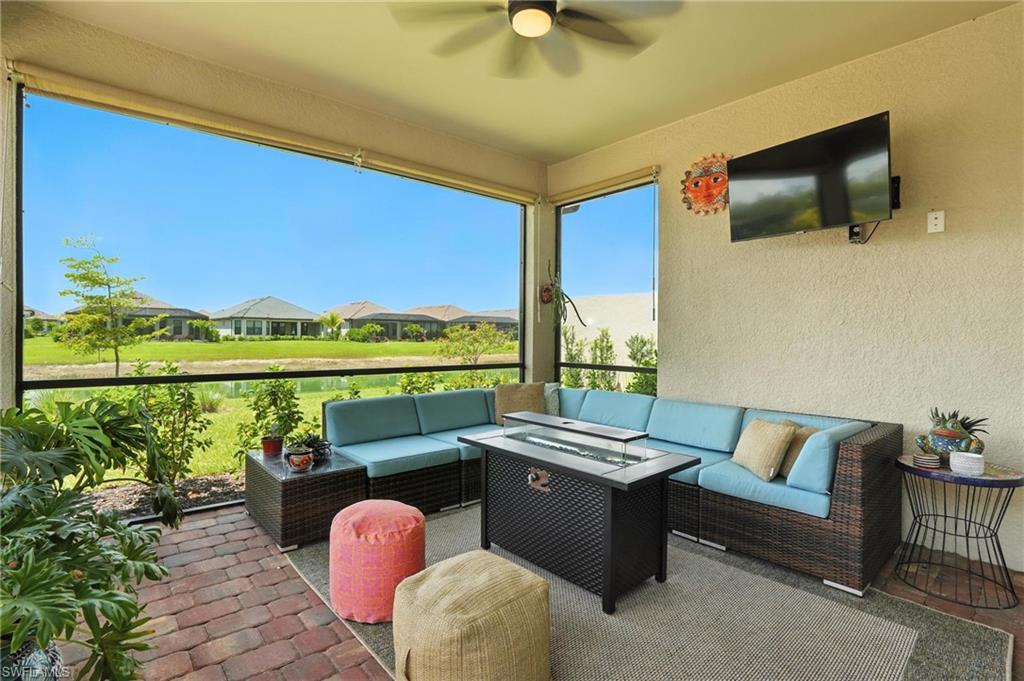 11945 Sacra Place Fort Myers, FL 33913 - Photo 31 of 50 View of patio featuring outdoor lounge area and ceiling fan