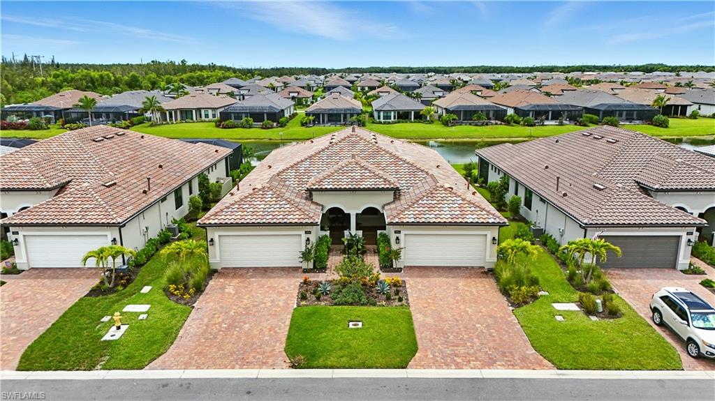11945 Sacra Place Fort Myers, FL 33913 - Photo 32 of 50 Aerial view of residential area