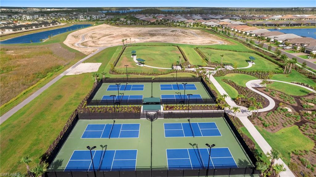 11945 Sacra Place Fort Myers, FL 33913 - Photo 50 of 50 Aerial view of residential area with a large body of water