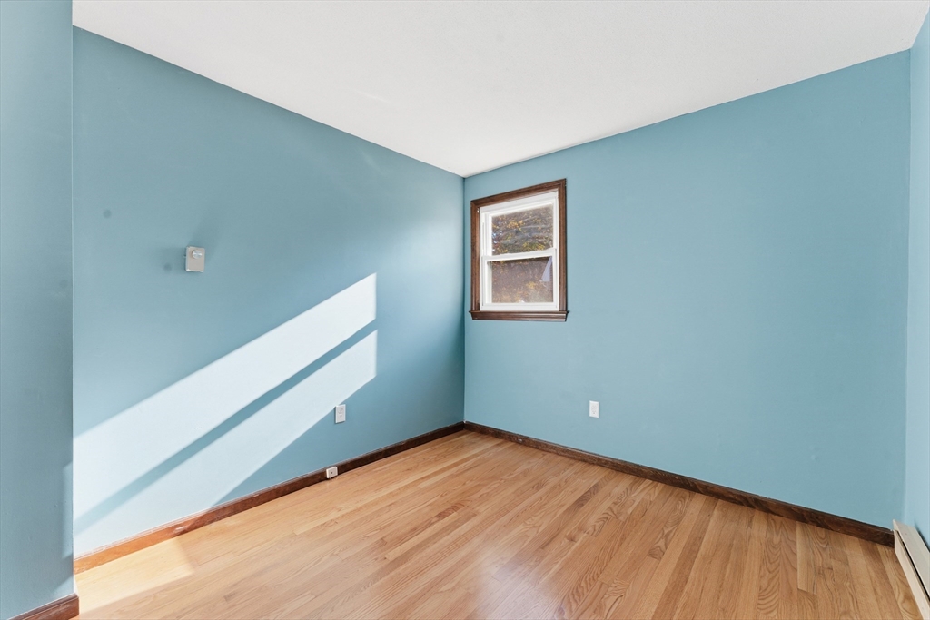 22 Phelps Street Easthampton, MA 01027 - Photo 22 of 42 a view of empty room with wooden floor