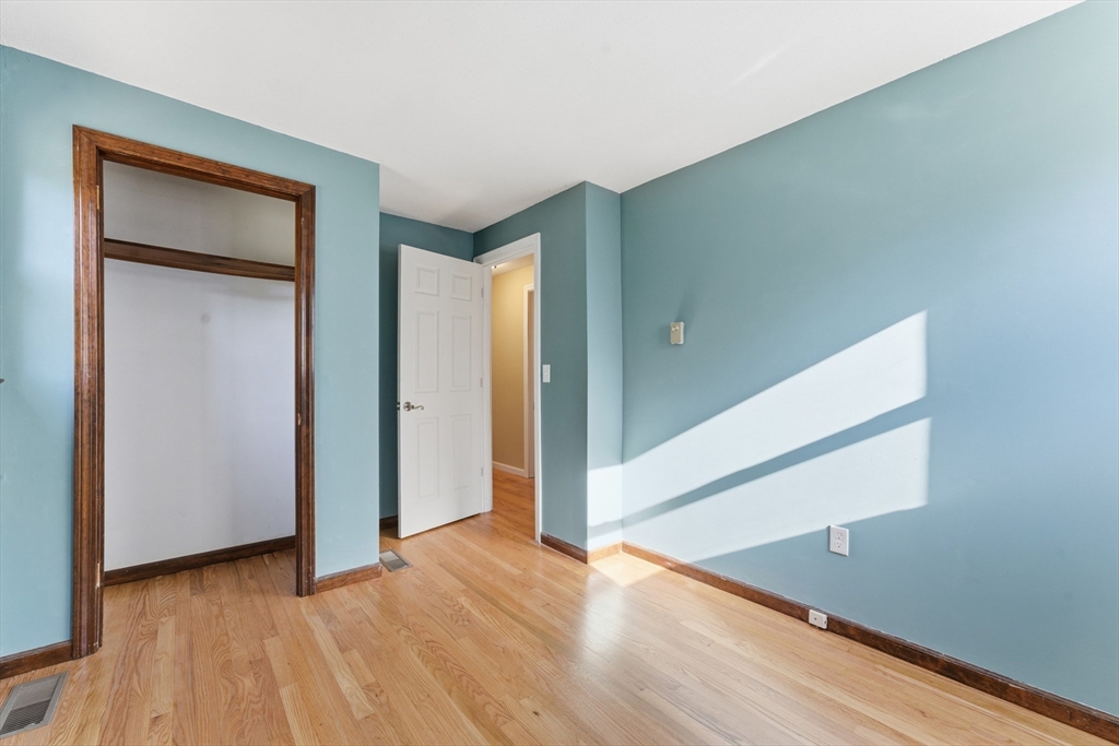 22 Phelps Street Easthampton, MA 01027 - Photo 23 of 42 a view of empty room with wooden floor