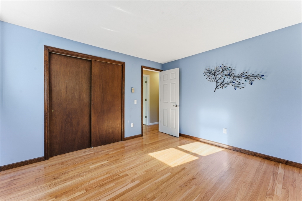 22 Phelps Street Easthampton, MA 01027 - Photo 26 of 42 a view of empty room with wooden floor