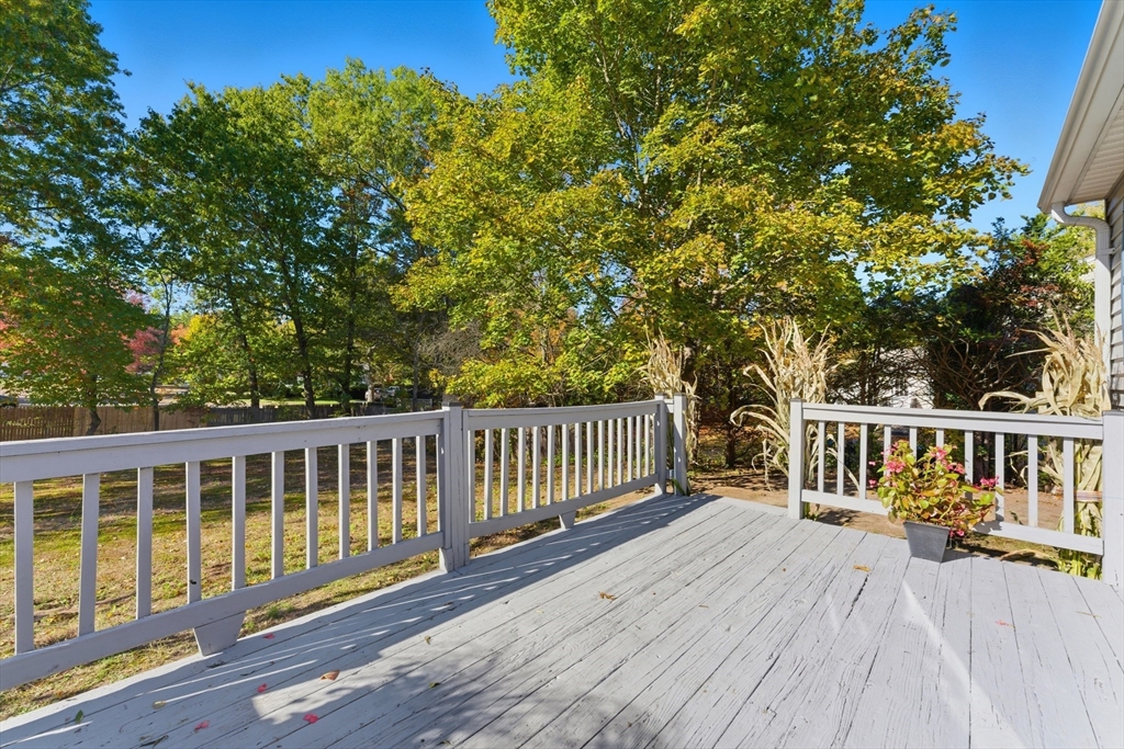 22 Phelps Street Easthampton, MA 01027 - Photo 36 of 42 a view of balcony with wooden floor and fence