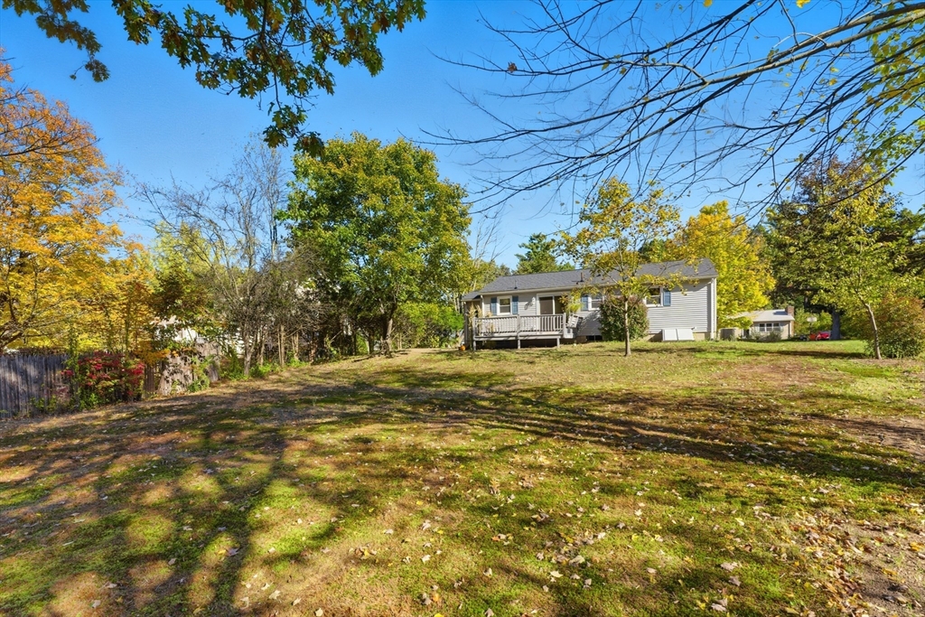 22 Phelps Street Easthampton, MA 01027 - Photo 4 of 42 a front view of a house with a big yard