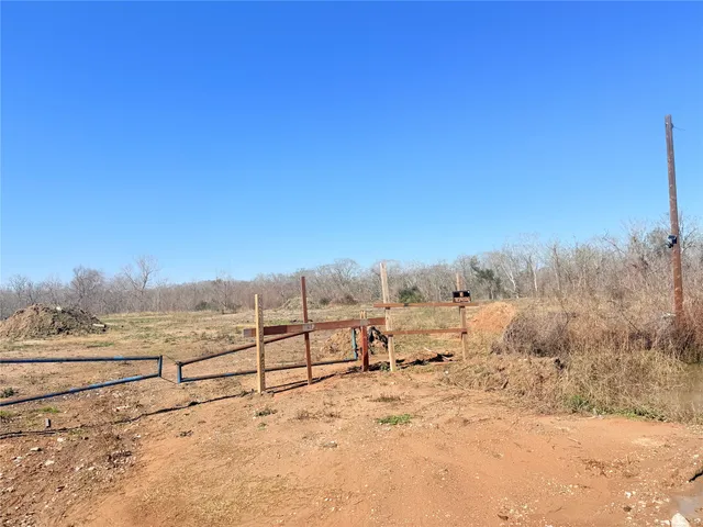 a view of mountain view with wooden fence