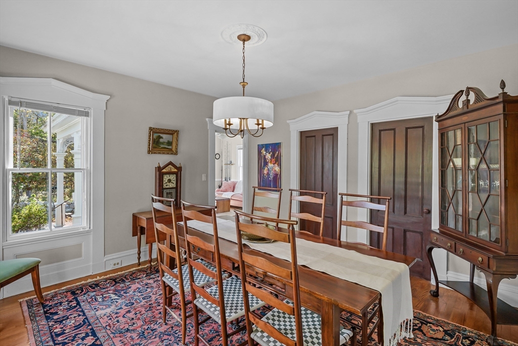 1881 Main Road Westport, MA 02791 - Photo 11 of 42 a dining room with furniture window wooden floor
