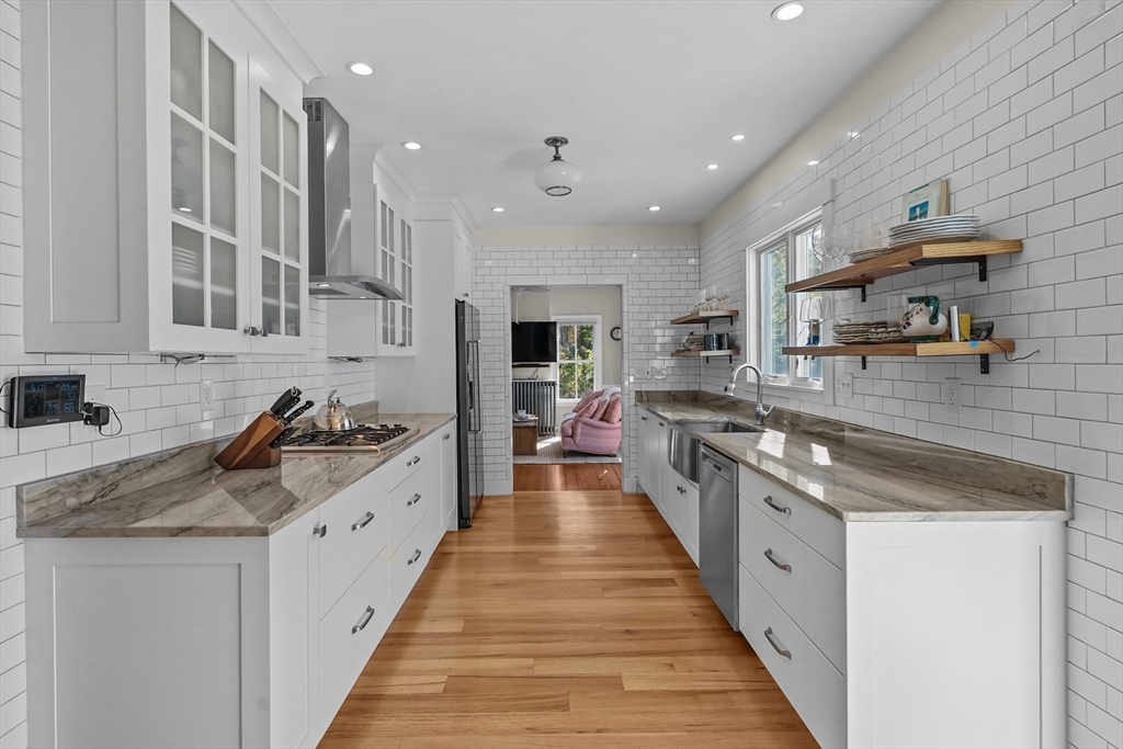 1881 Main Road Westport, MA 02791 - Photo 14 of 42 a large kitchen with stainless steel appliances lots of counter top space