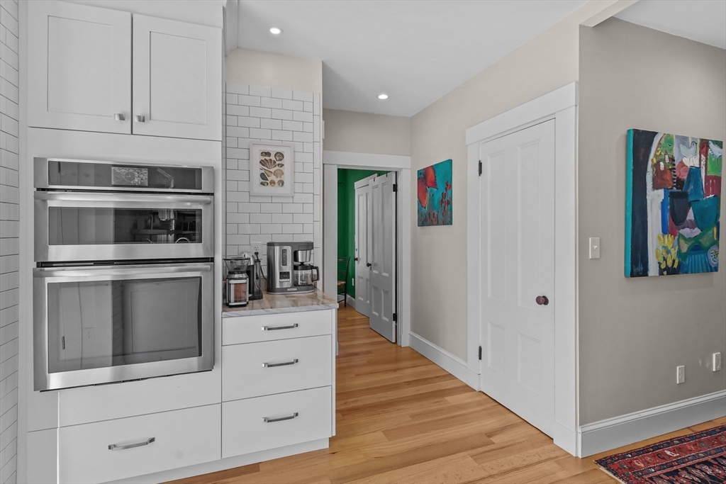 1881 Main Road Westport, MA 02791 - Photo 15 of 42 a kitchen with stainless steel appliances white cabinets and stainless steel appliances