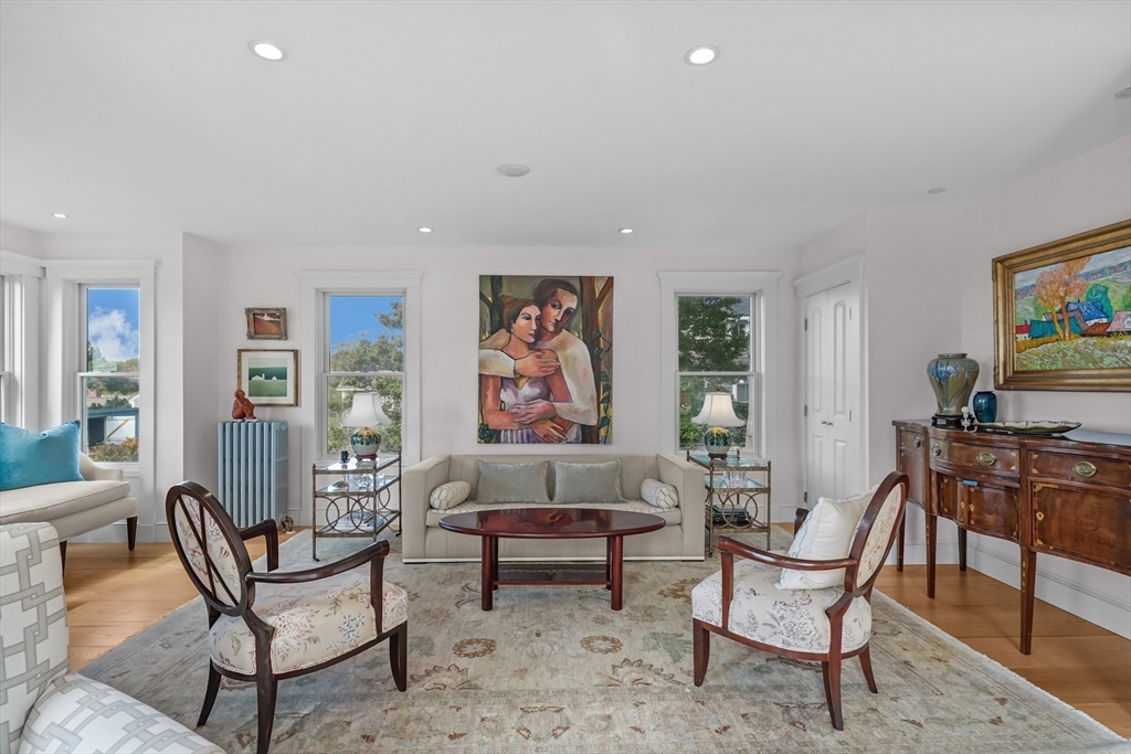 1881 Main Road Westport, MA 02791 - Photo 20 of 42 a living room with furniture and a flat screen tv