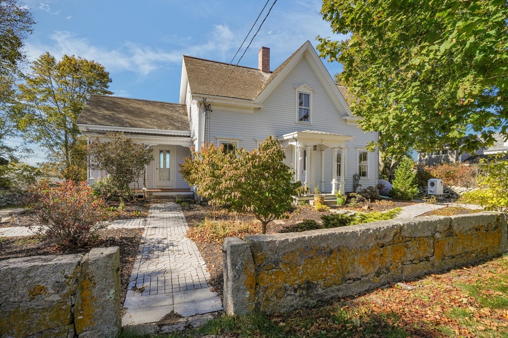 1881 Main Road Westport, MA 02791 - Photo 2 of 42 a front view of a house with garden