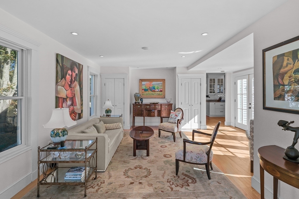 1881 Main Road Westport, MA 02791 - Photo 23 of 42 a living room with furniture and a painting on the wall