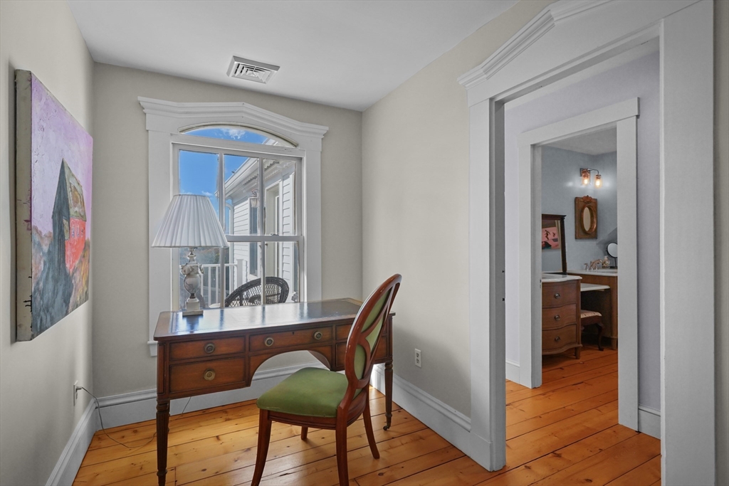 1881 Main Road Westport, MA 02791 - Photo 30 of 42 a view of a dining room with furniture and wooden floor