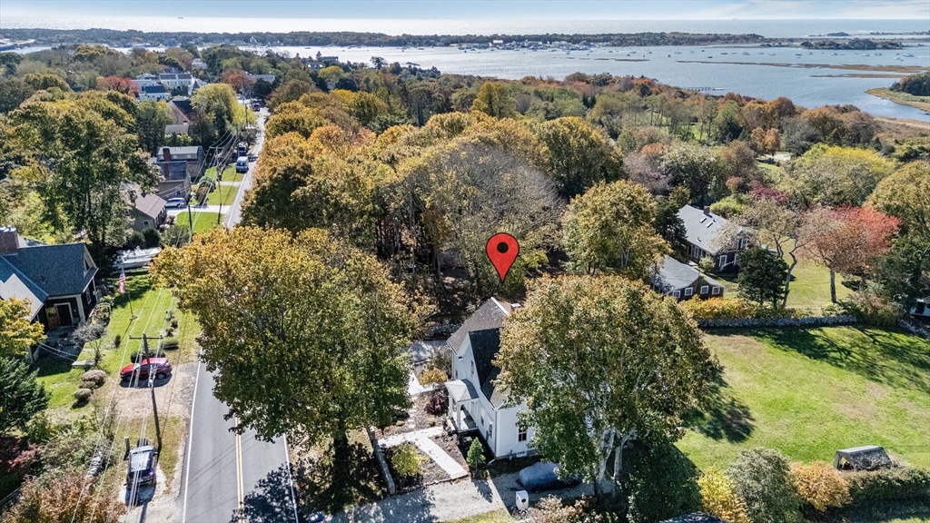 1881 Main Road Westport, MA 02791 - Photo 3 of 42 an aerial view of a houses with a lake view