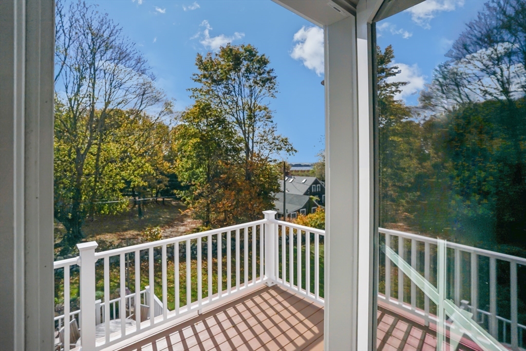 1881 Main Road Westport, MA 02791 - Photo 34 of 42 a view of a balcony with wooden floor