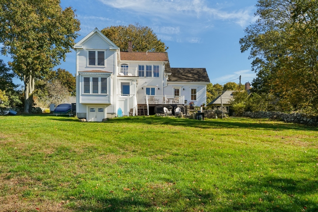 1881 Main Road Westport, MA 02791 - Photo 5 of 42 a front view of a house with a yard