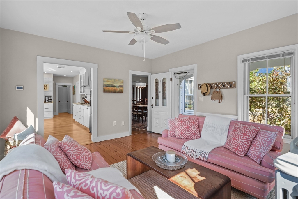 1881 Main Road Westport, MA 02791 - Photo 8 of 42 a living room with furniture and a large window