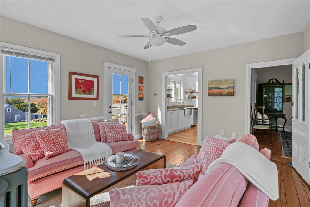 1881 Main Road Westport, MA 02791 - Photo 10 of 42 a living room with furniture and wooden floor