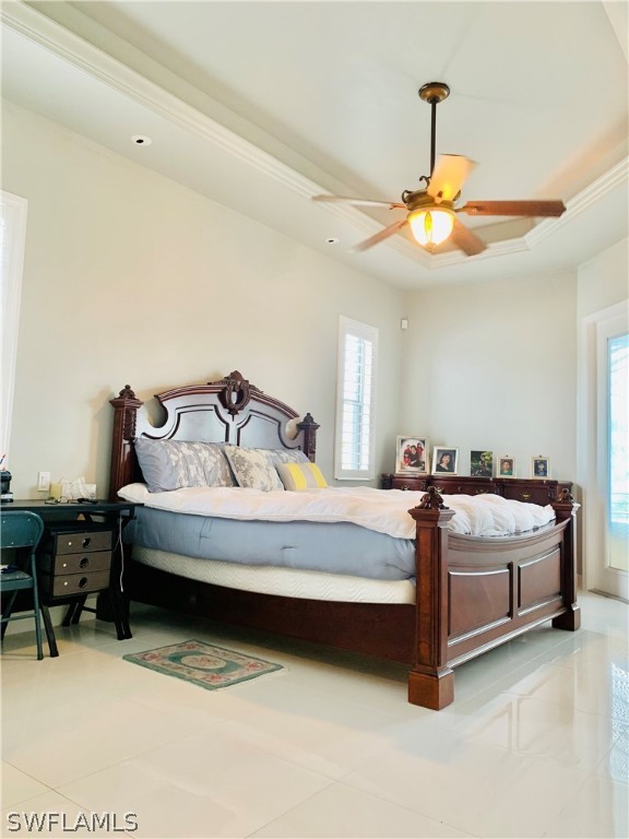 17409 Fuchsia Road Fort Myers, FL 33967 - Photo 18 of 35 a bedroom with bed and window