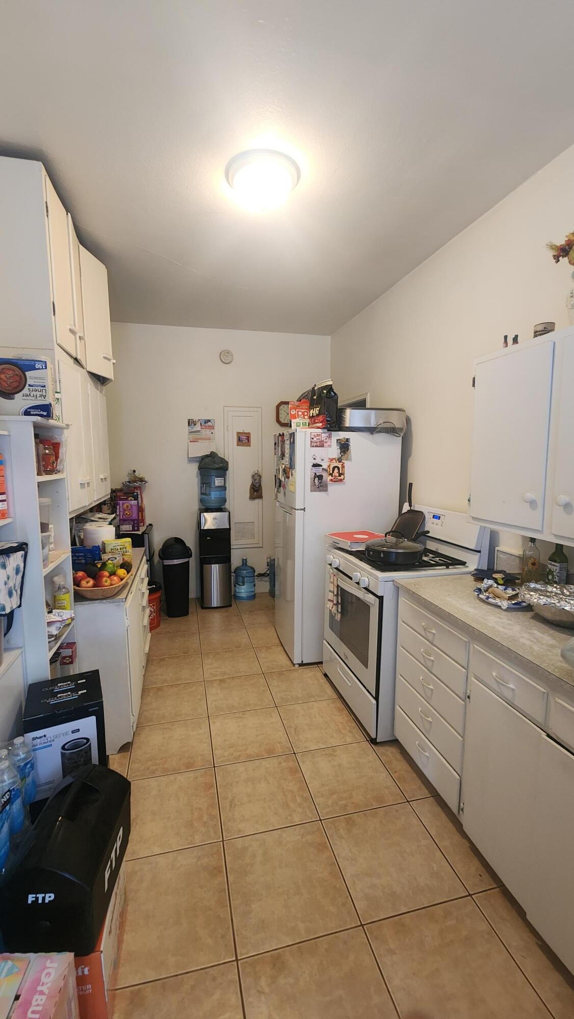 806 East Main Street Santa Maria, CA 93454 - Photo 18 of 29 a kitchen with stainless steel appliances granite countertop a stove and a refrigerator