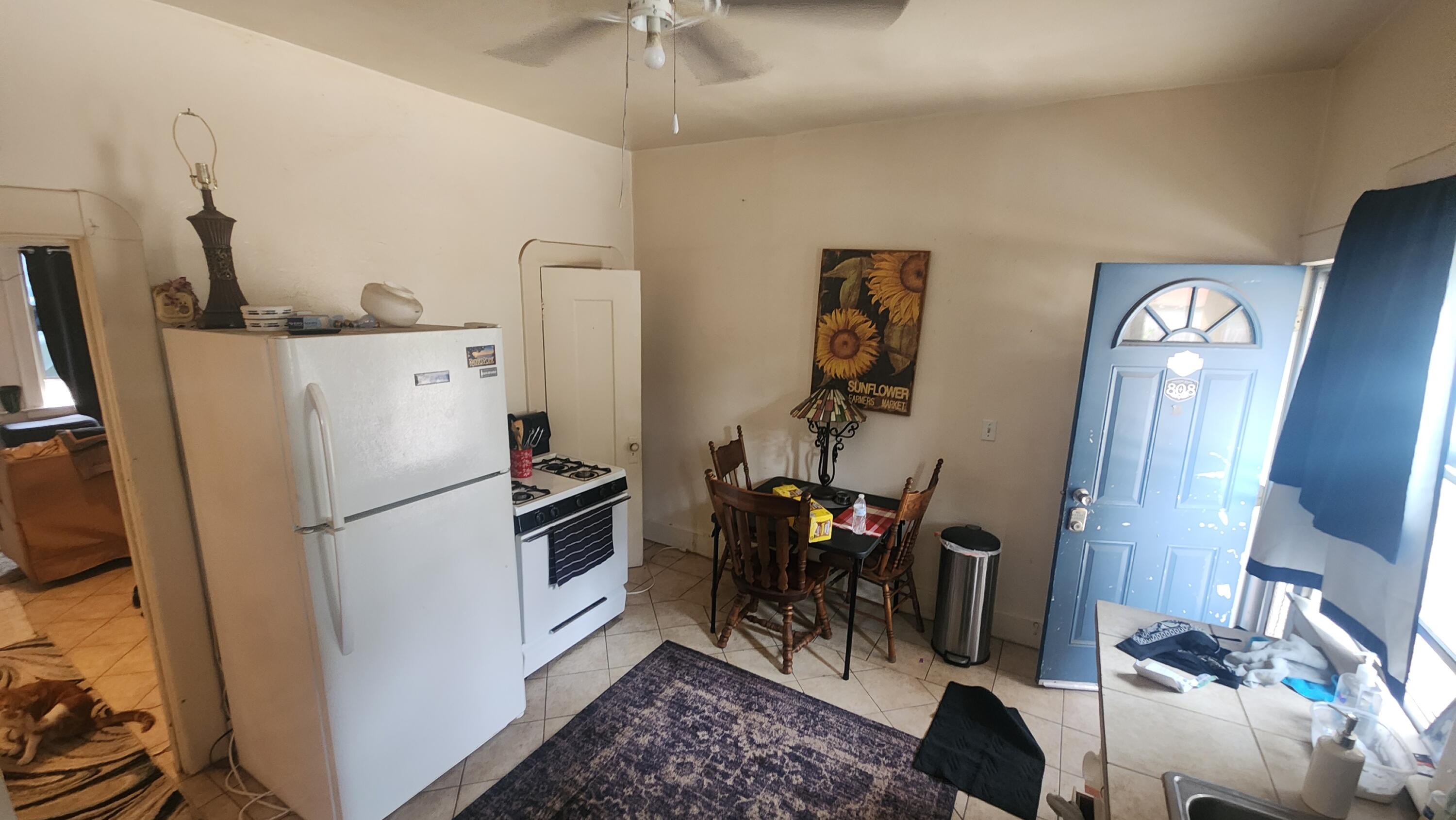 806 East Main Street Santa Maria, CA 93454 - Photo 5 of 29 a kitchen with stainless steel appliances granite countertop a refrigerator and a stove