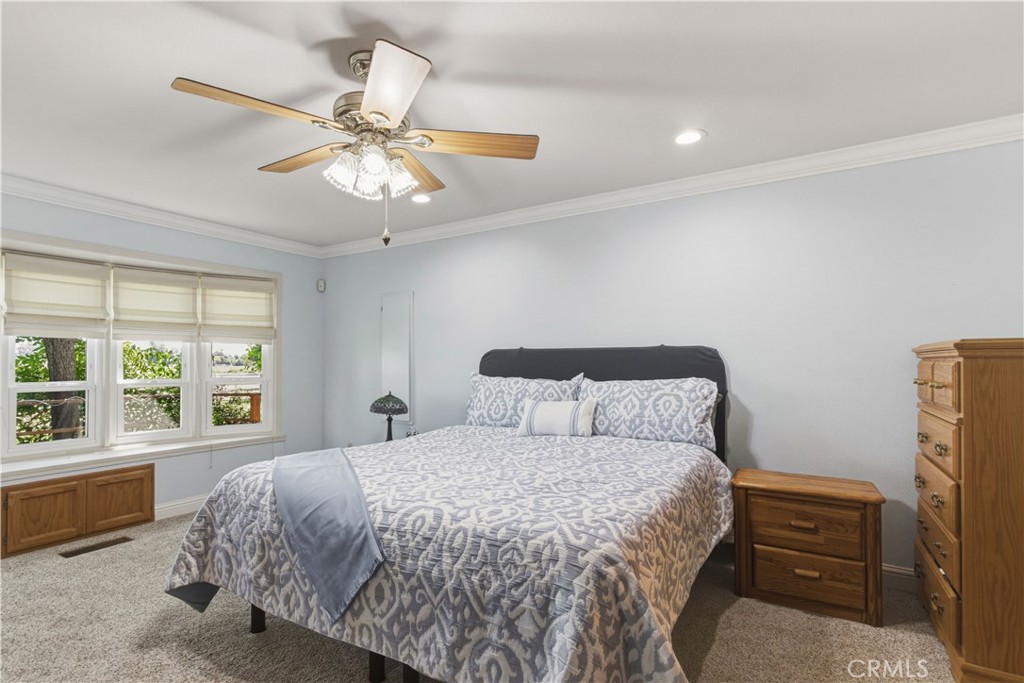 3856 North Gardner Avenue Merced, CA 95340 - Photo 21 of 59 a bedroom with a bed and a large window