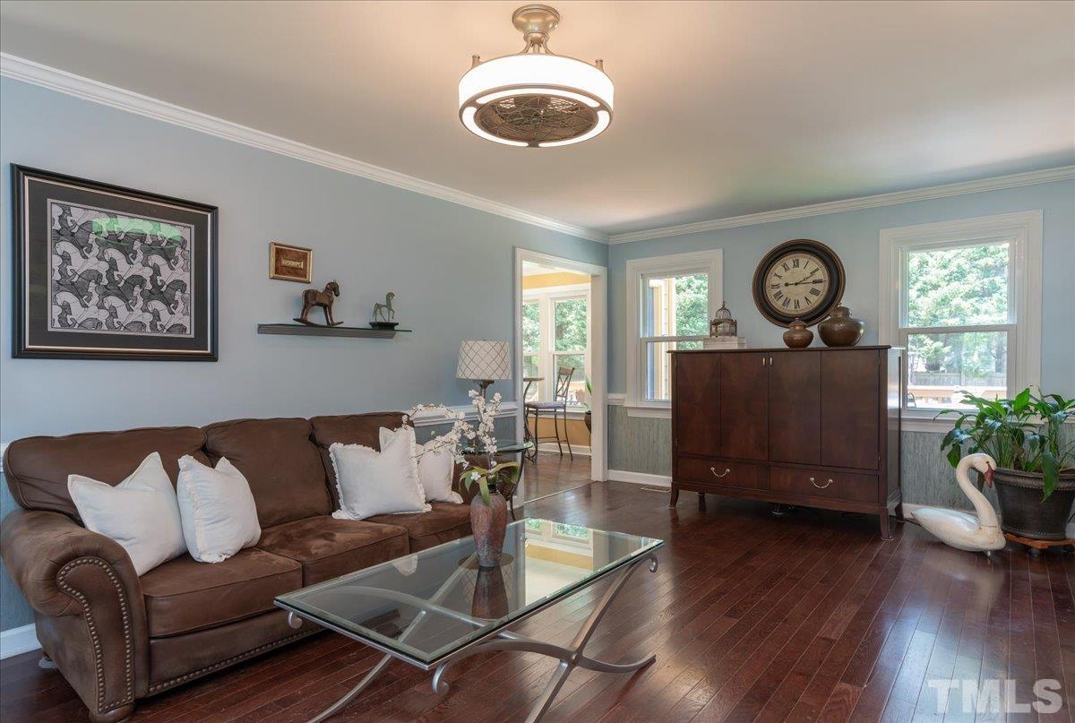 908 Broadhaven Drive Raleigh, NC 27603 - Photo 14 of 33 a living room with furniture and a wooden floor