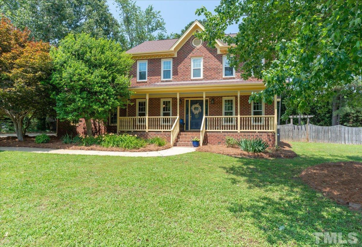 908 Broadhaven Drive Raleigh, NC 27603 - Photo 2 of 33 a front view of a house with a yard and green space